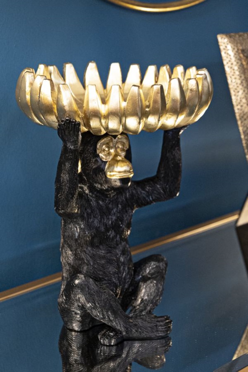 Dekofigur Affe Schimpanse sitzend Tierfigur mit goldener Bananenschale auf dem Kopf H 31,5 cm